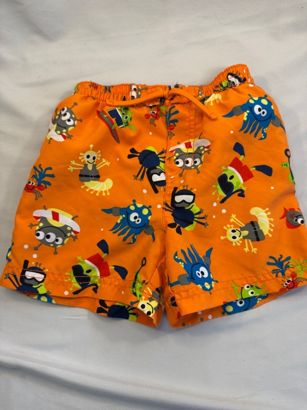 Place Orange Swim Shorts with Colorful Sea Creature Pattern